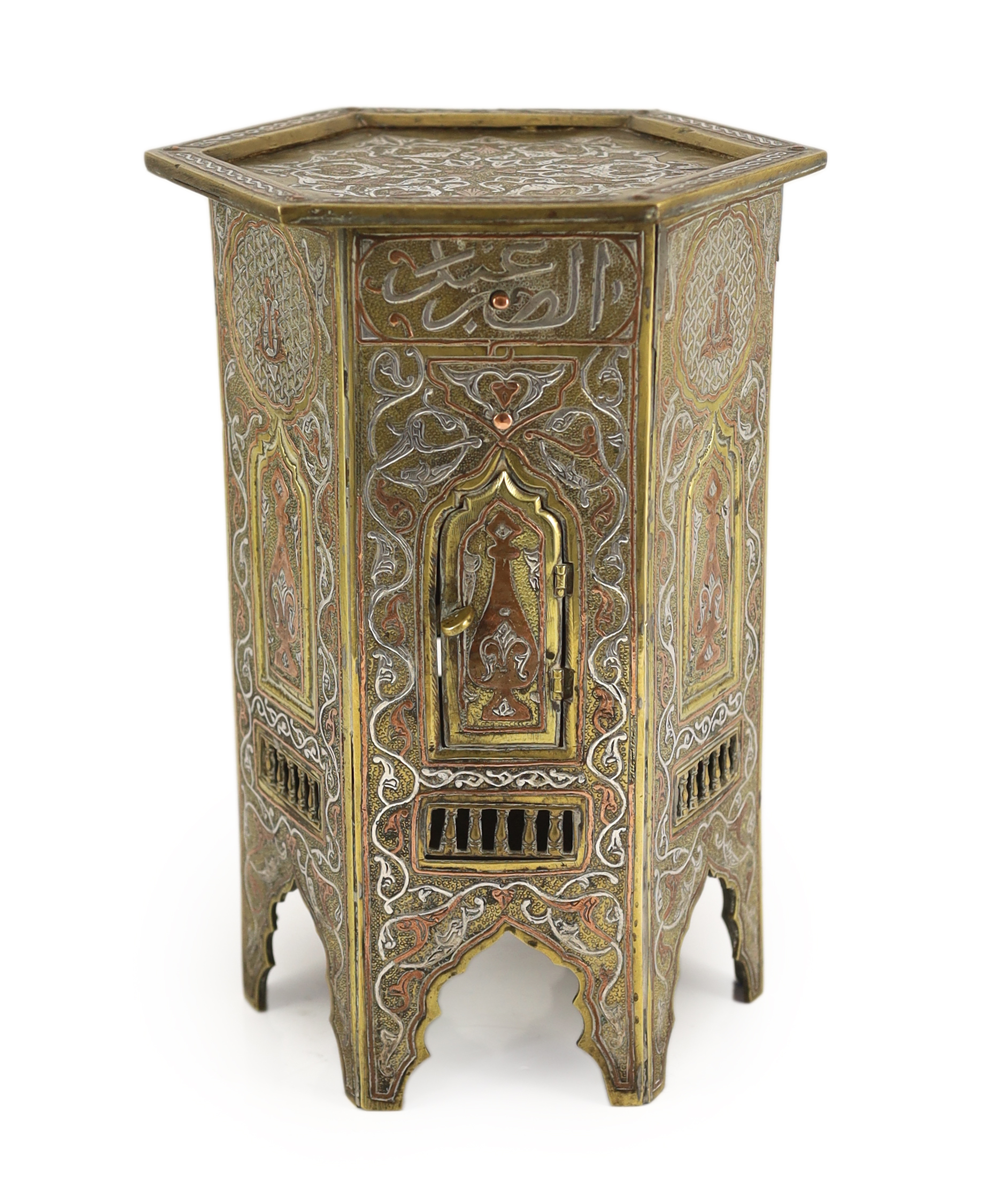 A Cairo ware silver and copper inlaid brass Qur’an stand, early 20th century